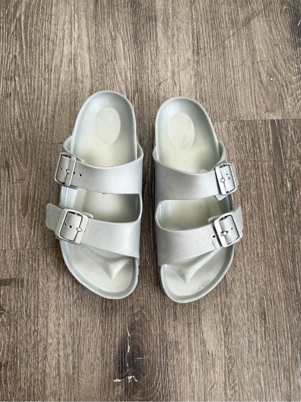 Birkenstock women’s Two-Buckle Slide Sandals in Light Silver